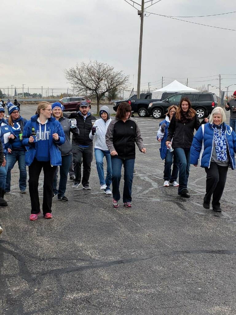 Sandy dancing with Colts fans.