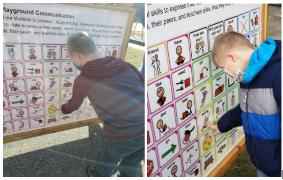 Side by side photos of a two different young male students pointing to words on a large outdoor augmentative and alternative (AAC) board