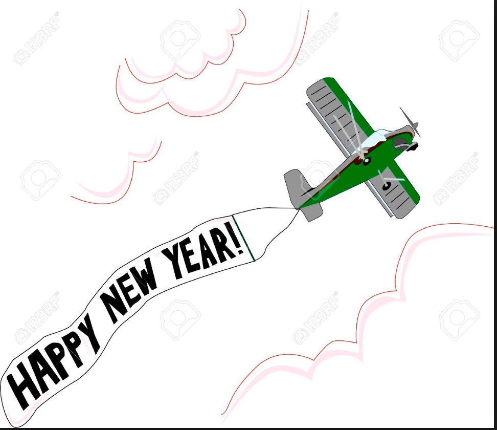 Happy New Year written on a sign behind a plane