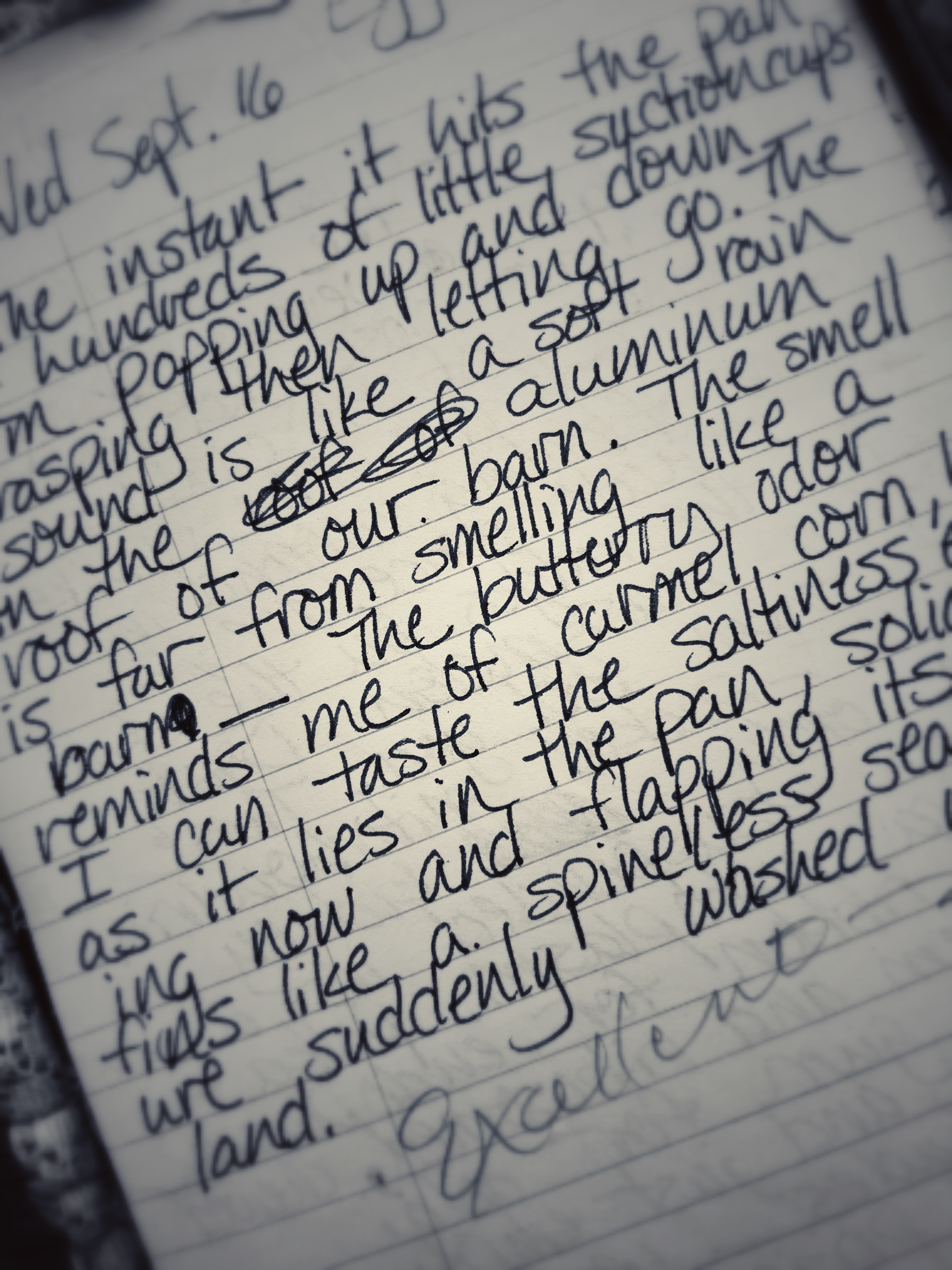 Writing on notebook paper.