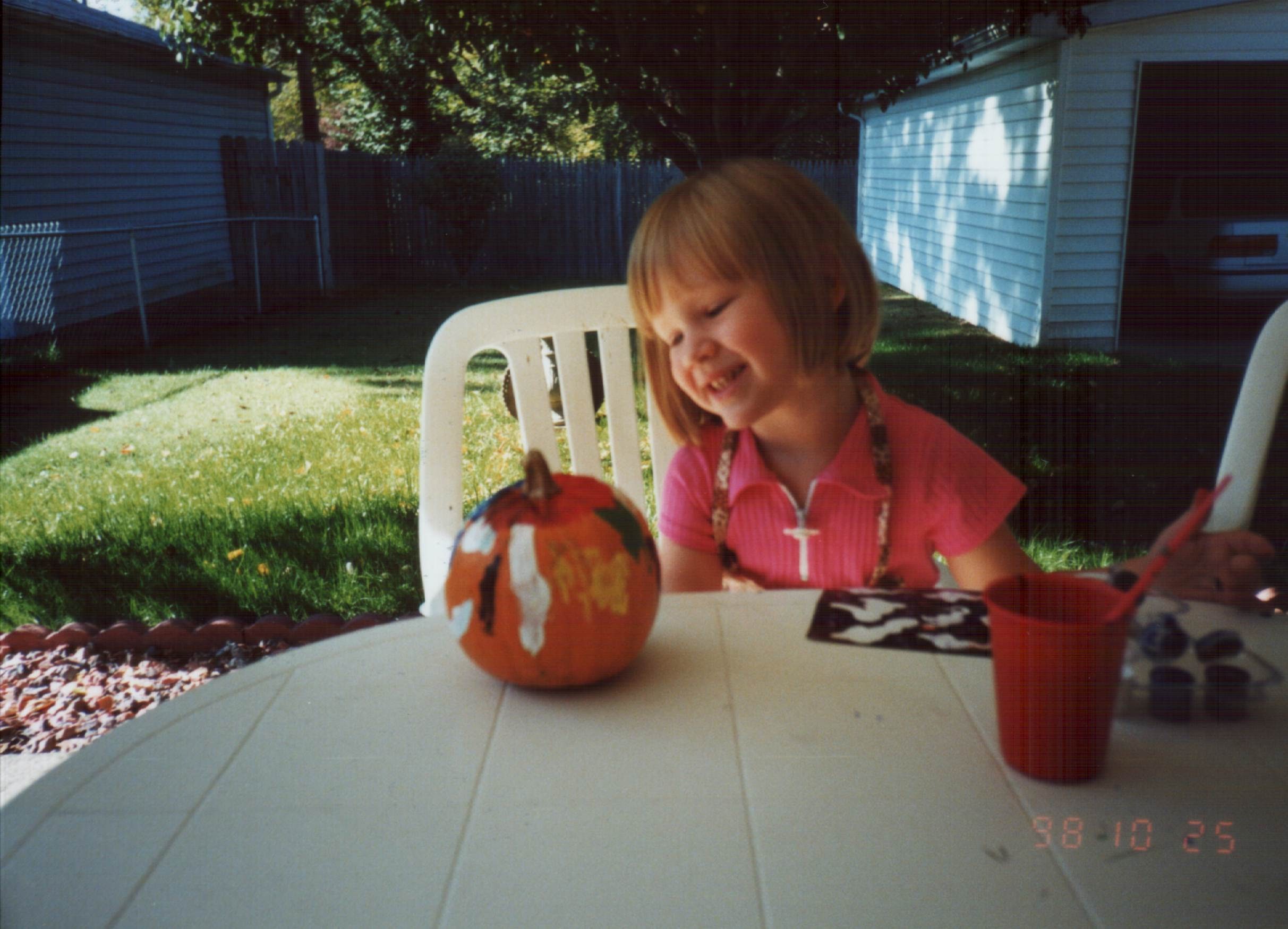 Sandy's daughter Courtney painting pumpkins