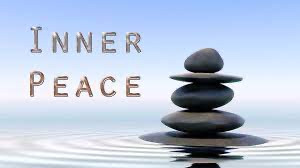 Discovering Your Inner Peace - rock cairn on water