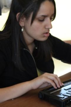 Student using a Braille Notetaker